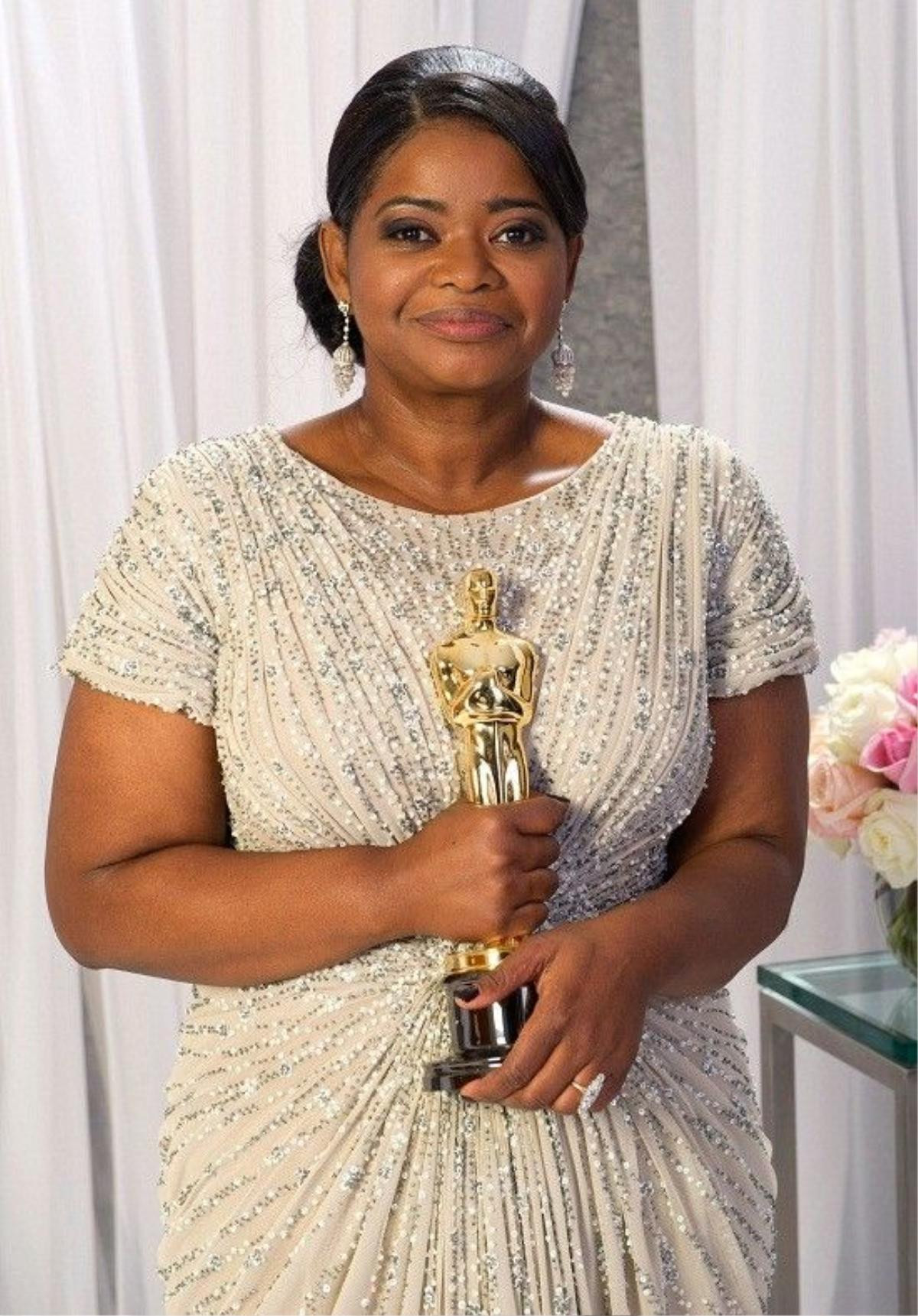 Oscar®-winning actress Octavia Spencer, winner for Performance by an Actress in a Supporting Role for her role in "The Help", poses backstage for the media during the live ABC Television Network broadcast of the 84th Annual Academy Awards® from the Hollywood and Highland Center, in Hollywood, CA, Sunday, February 26, 2012.